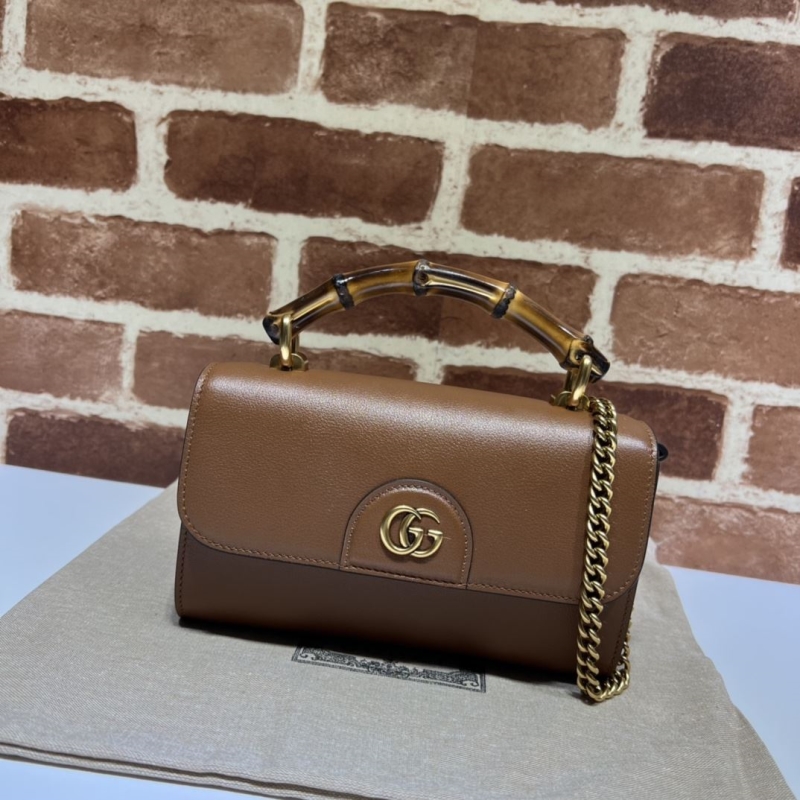G*u*i top handle bags